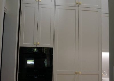 high kitchen cabinets in white