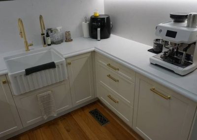 white kitchen with coffee maker