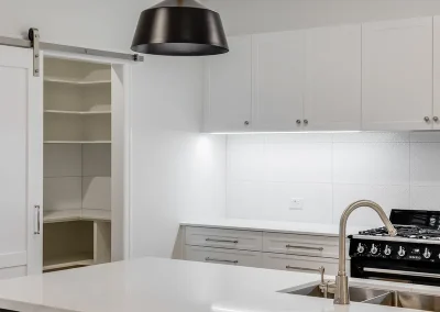 white and gray kitchen with island