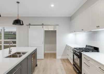 white and gray kitchen with stove